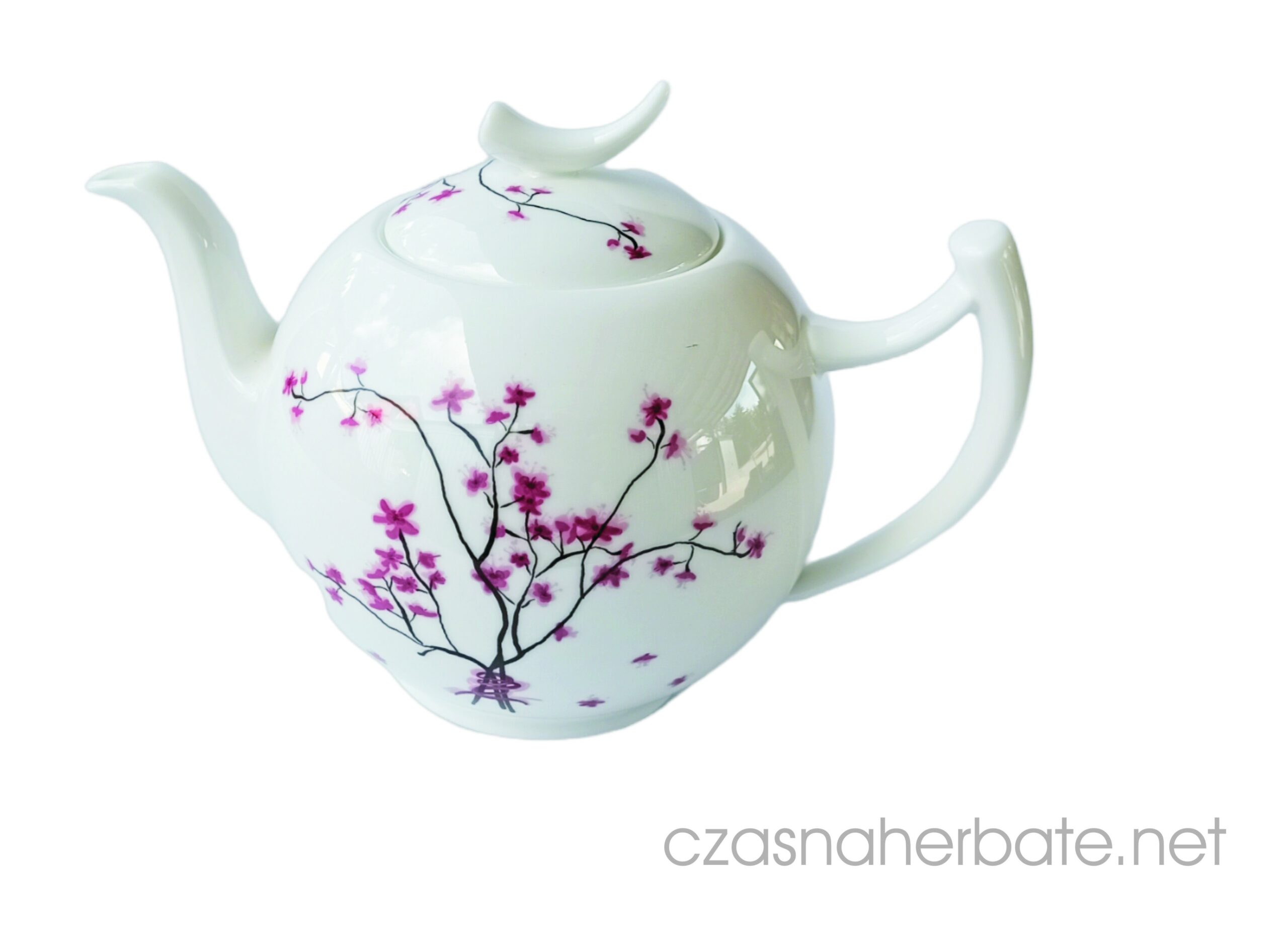 Porcelanowy czajniczek do herbaty ozdobiony wzorem z gałązką kwitnącej wiśni w odcieniach różu i czerni.