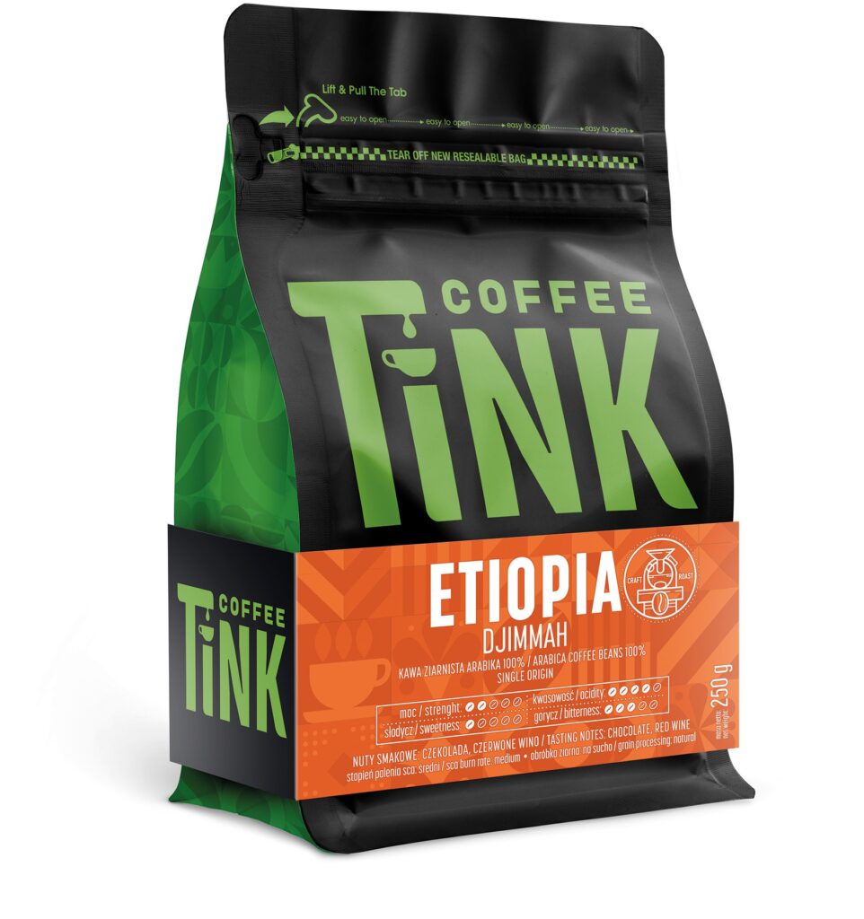 Czarne opakowanie kawy Coffee Tink z pomarańczową etykietą