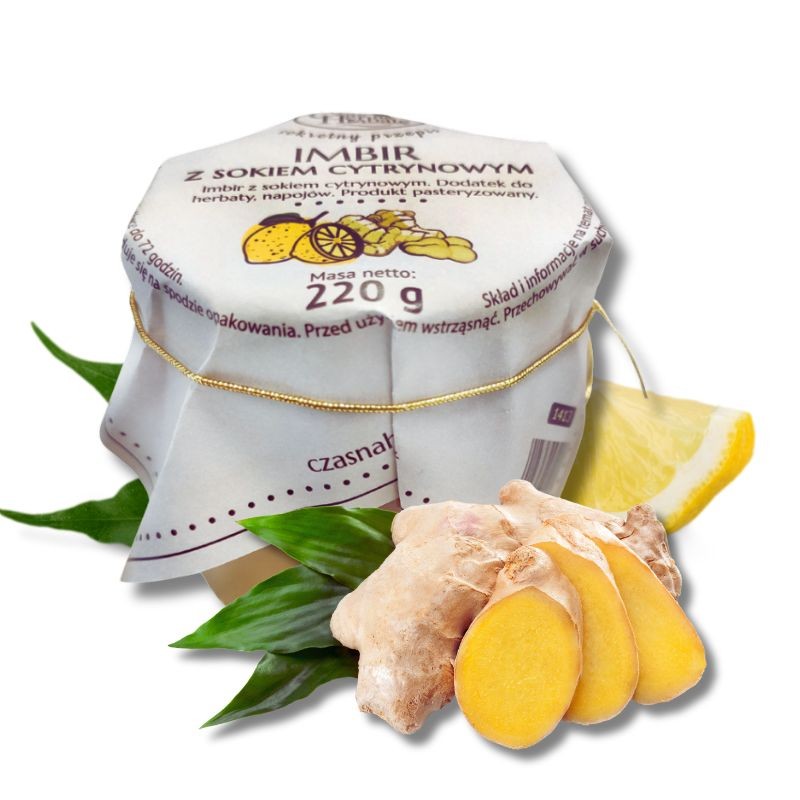 Słoik z białą etykietą na górze obwiązaną gumką, obok cytryna i imbir