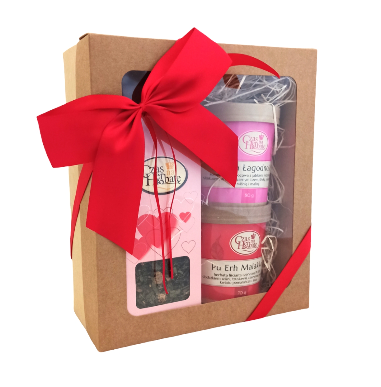 Widok z boku na zestaw prezentowy z czerwoną kokardą: Kraina Łagodności, Pu Erh Malakka, herbata liściasta, Czas na Herbatę.