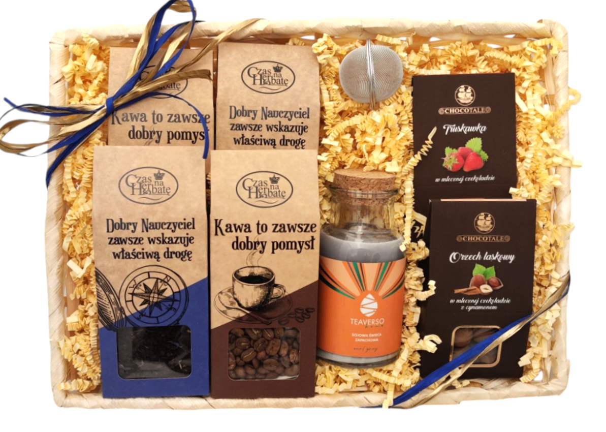 Front view of gift basket with coffee, tea, brew, candle, chocolate with nuts and strawberries, decorated with ribbon.