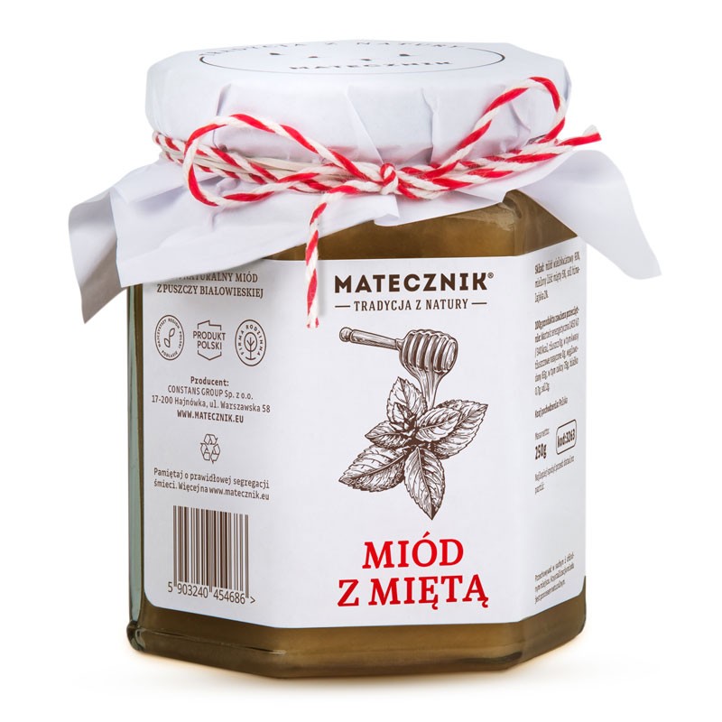 Słoik miodu Matecznik „Miód z miętą”, dekoracyjnie zapakowany z białą serwetką i czerwono-białym sznurkiem, etykieta z rysunkiem liści mięty.