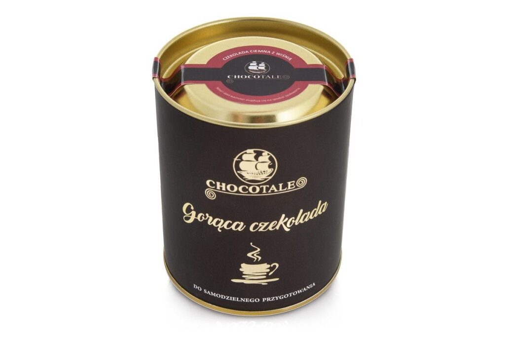 Gorąca czekolada Chocotale w eleganckiej, okrągłej puszce do samodzielnego przygotowania, złote wieczko i czarno-złote etykiety.