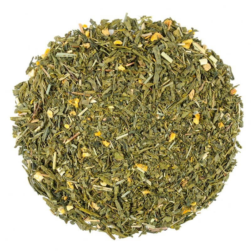 Zielona herbata z dodatkiem trawy cytrynowej i skórki cytrusowej, jasnozielony, drobno cięty susz widziany z góry.